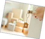 Moving house, relocation. Man hold key house keychain in new apartment. move in new home. Buy or rent real estate. flat tenancy, leasehold property, new landlord, investment, dwelling, loan, mortgage.